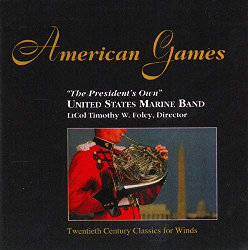 "CD cover with a marine in red uniform holding a French horn."