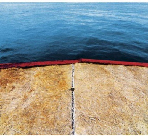 A CD case with a photo of a body of water and a wooden dock.