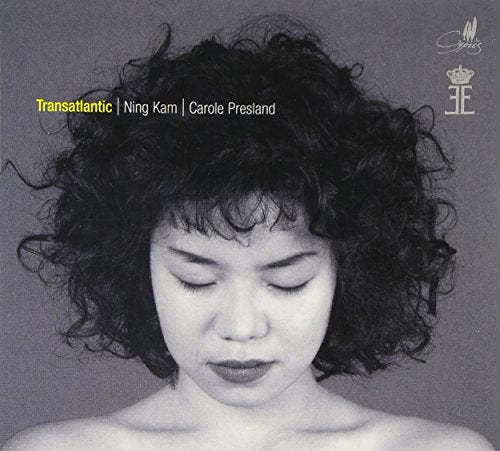 A black and white image of a woman's face on a CD cover.