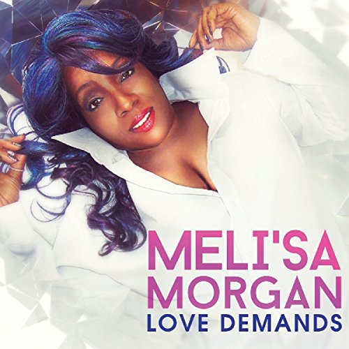"Album cover featuring a woman with blue hair lying on a mirrored surface."