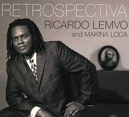 Black and white album cover featuring a man in a suit.