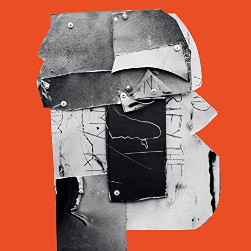 Collage of metal scraps forming the letter "B" on an orange background.