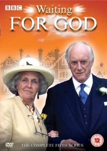 "An older couple in formal attire on a DVD cover for 'Waiting For God' series."