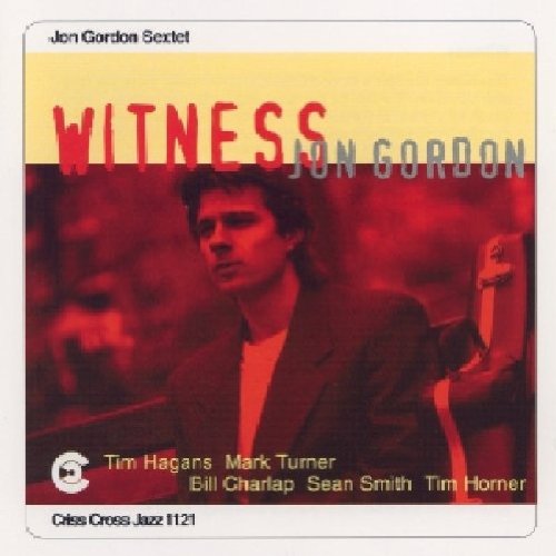 The image depicts a jazz album cover featuring a man in a suit.