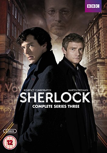 DVD cover for "Sherlock - Series 3" featuring two men in dark coats standing back-to-back.