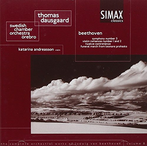 CD cover featuring a black and white landscape under a cloudy sky.