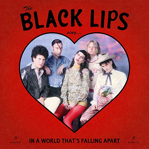 Red album cover featuring The Black Lips band portrait inside a heart.