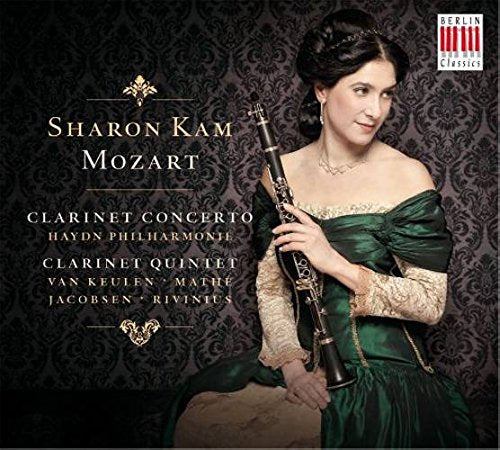 A woman in a green dress holding a clarinet, classical music CD cover.