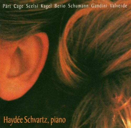 CD cover featuring a close-up of a person's ear and hair.