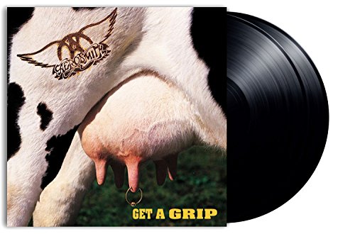 Aerosmith “Get A Grip” vinyl record with cow imagery and ring piercing.