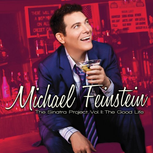 "Album cover featuring Michael Feinstein in a suit, holding a cocktail, in a red-lit bar."