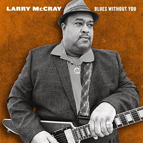 Larry McCray album cover, portrait of a man with a guitar.