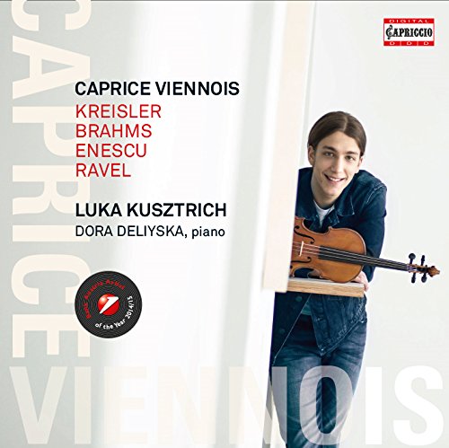 "CD cover featuring a young man holding a violin, smiling."
