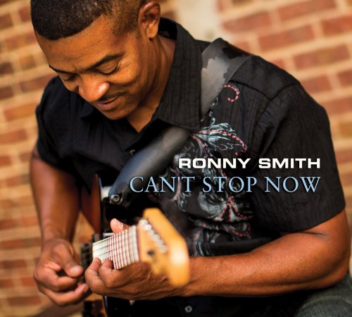 Ronny Smith with a guitar, album cover for "Can't Stop Now".