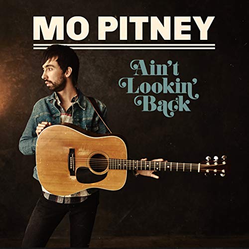 Mo Pitney with acoustic guitar, album cover for "Ain't Looking Back.