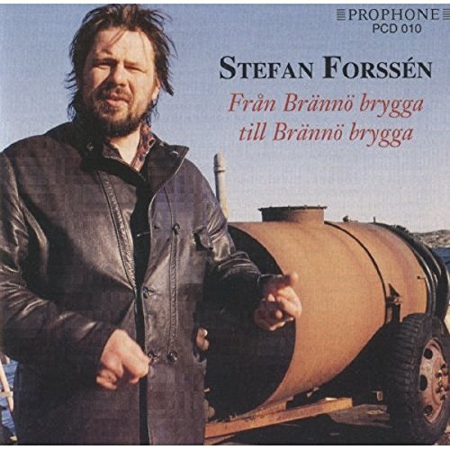 CD cover featuring a man in a leather jacket beside a large metal tank.