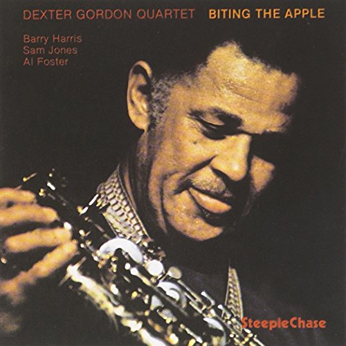 "Album cover featuring a man playing saxophone with text 'Dexter Gordon Quartet Biting The Apple'."