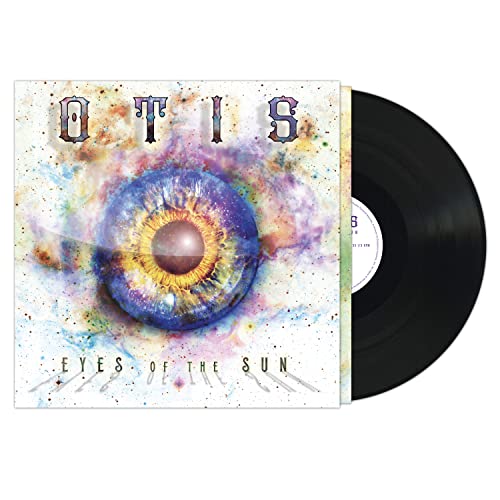 Vinyl record with cover art featuring a colorful, detailed human eye.