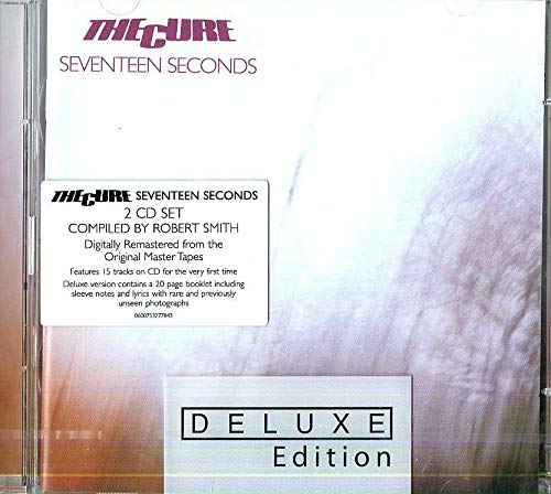 The Cure Seventeen Seconds CD deluxe edition with a white and abstract brown cover.