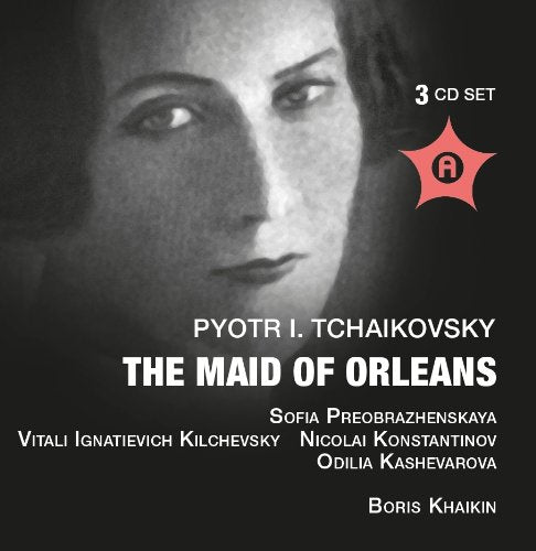 "Black-and-white album cover with a woman's face and white text on dark background."