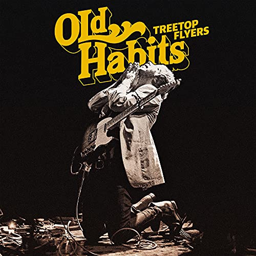 CD cover for Treetop Flyers’ “Old Habits” featuring a guitarist.