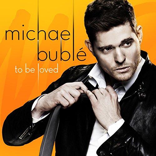 "Album cover with Michael Bublé in a leather jacket against an orange background."