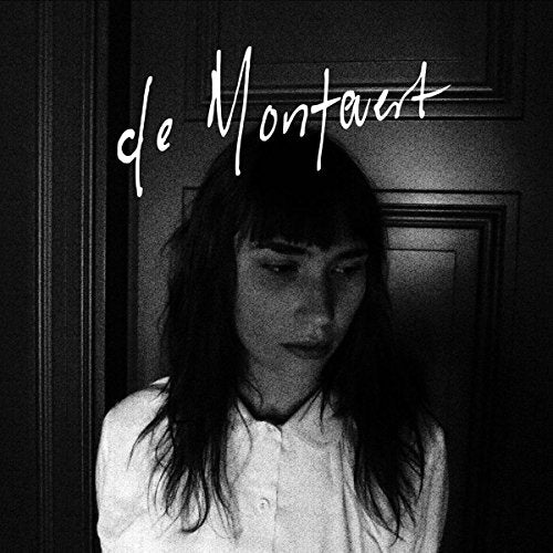 Black and white album cover featuring a woman with long hair.