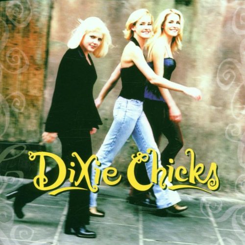 "Dixie Chicks album cover featuring three blonde women walking on a sidewalk."