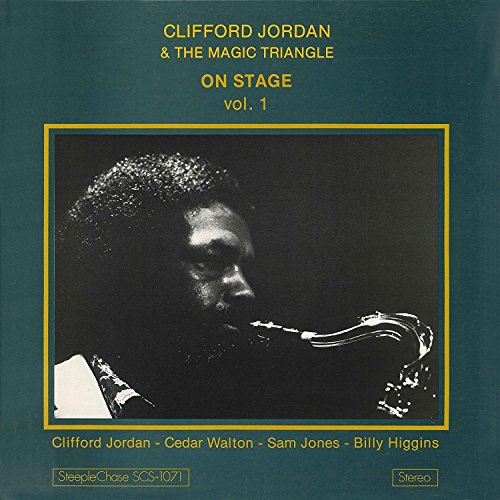 "Album cover with a black-and-white photo of a man playing a saxophone."