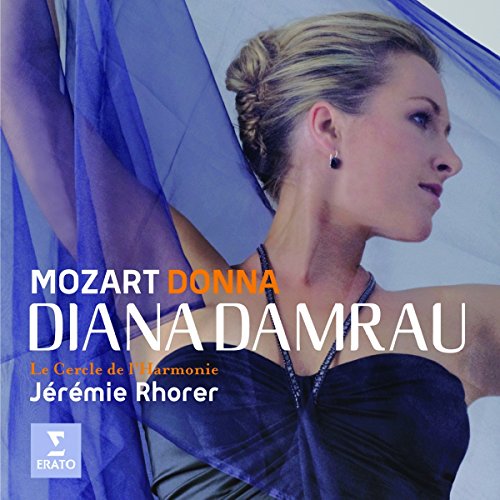 A woman in a blue dress, with text overlay describing a Mozart opera album.