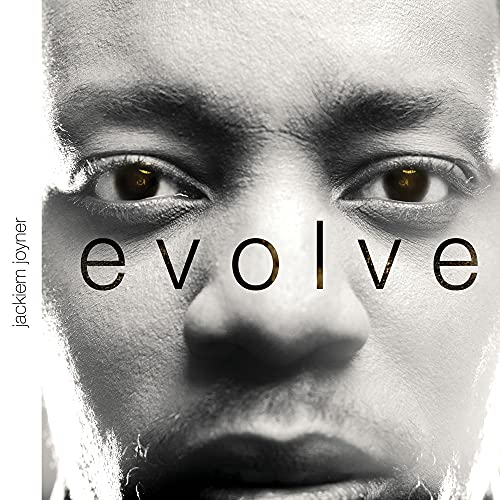 Close-up of Jackiem Joyner with the album title "Evolve" overlaid.