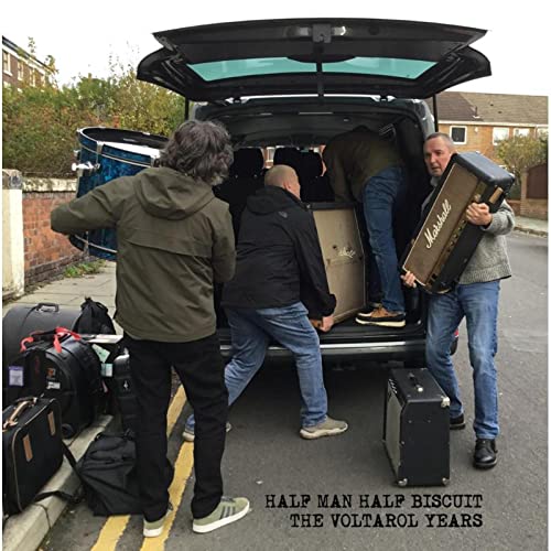 CD cover: band members loading equipment from a car trunk.