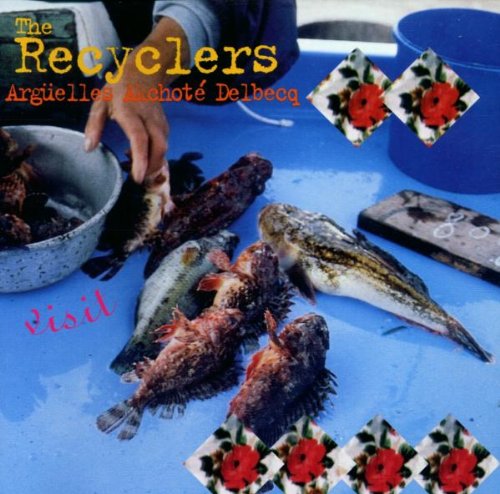 "CD cover with fish on a blue table, person reaching for a fish."