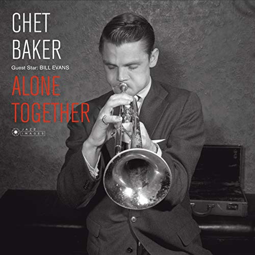 Black and white portrait of Chet Baker playing a trumpet.