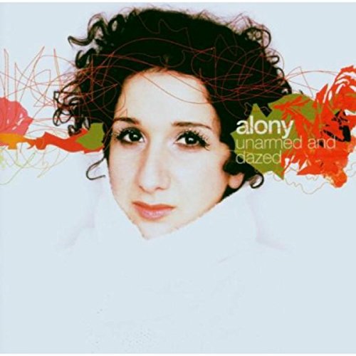 "Album cover featuring a woman with curly hair, surrounded by abstract red and green shapes."