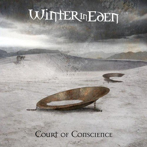 "Album cover with a rusty metal bowl in a snowy landscape and dark sky."
