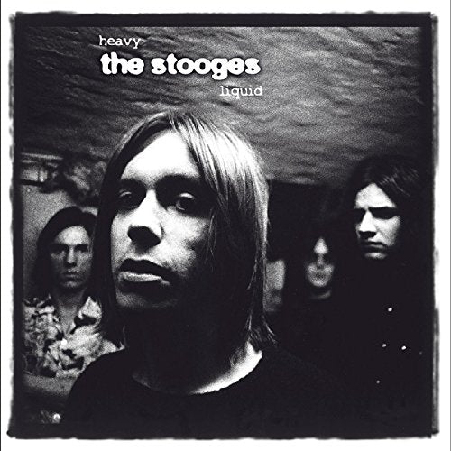 Black and white CD cover of The Stooges with band members’ portraits.