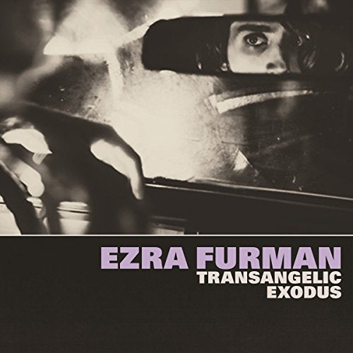Black and white album cover featuring a man playing a piano.