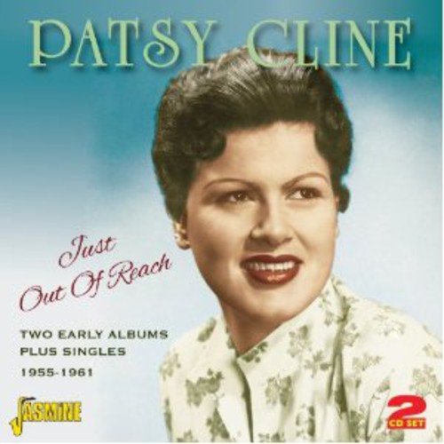 "Patsy Cline smiling on a CD cover with blue gradient background."