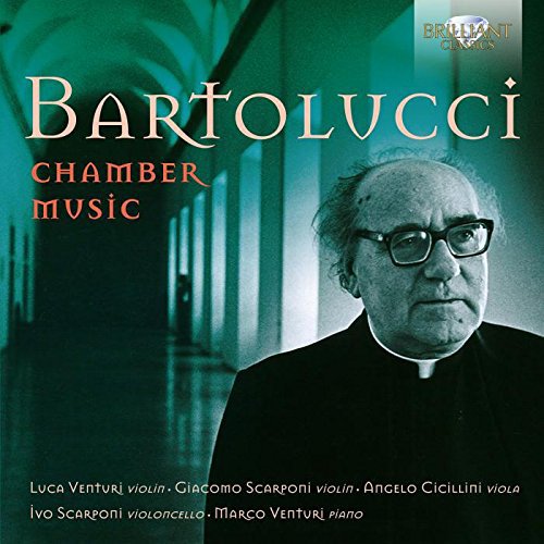 CD cover with a man in clerical attire and arched hallway background.