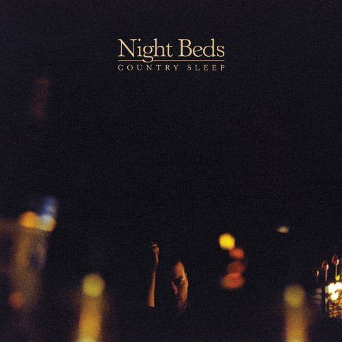 A dark album cover with a woman's silhouette and the text "Night Beds - Country Sleep".