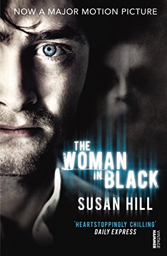 Book cover: man's face with ghostly woman in background, title "The Woman in Black".