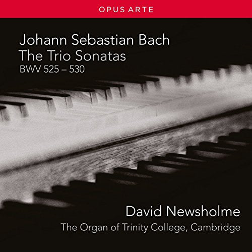 "CD cover with black and white organ keys and white text on black background."