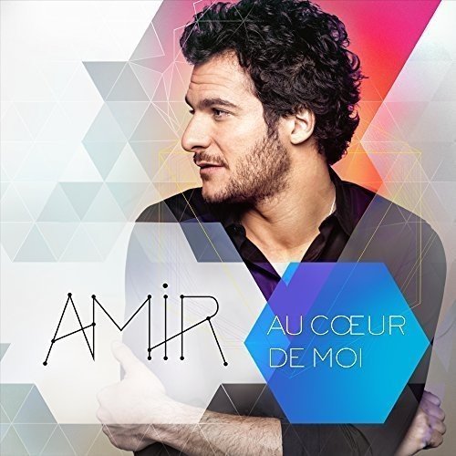 CD cover featuring a portrait of singer Amir against a geometric background.