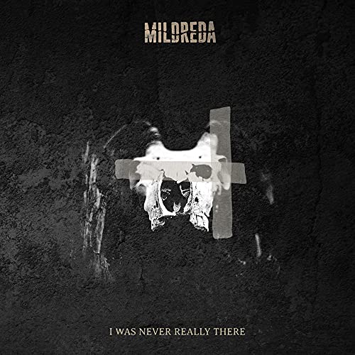 Album cover: skull with tape over eyes, dark textured background.