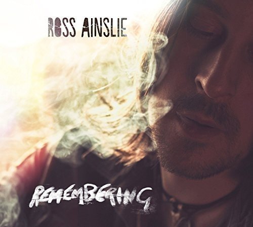 Album cover featuring a man with closed eyes surrounded by smoke.