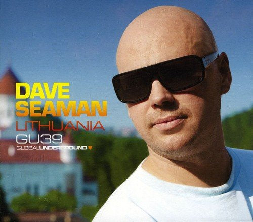 "Album cover featuring a bald man in sunglasses with text 'Dave Seaman Lithuania'."