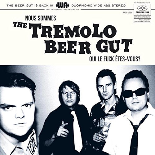 "Black and white vinyl album cover featuring four men and bold text."