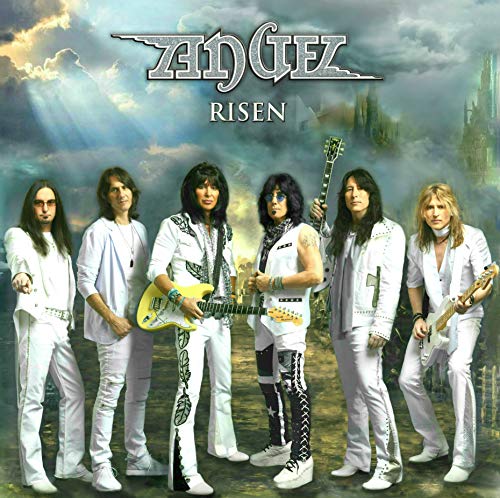 "Two white vinyl records with album covers featuring a band in white outfits."