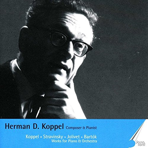 Black and white portrait of composer Herman D. Koppel wearing glasses.